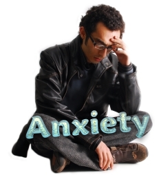 Worried looking man sits cross legged on floor. Photo Ramzi Hashisho